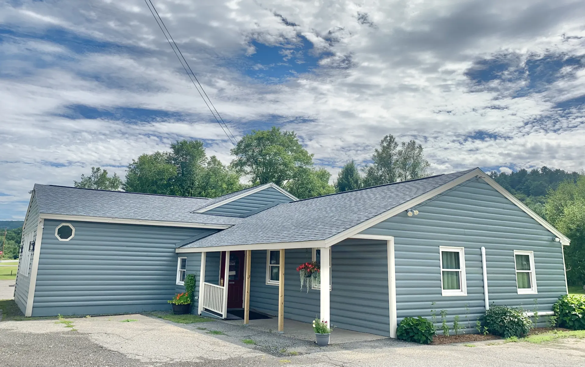 The front entrance and covered porch at Alder