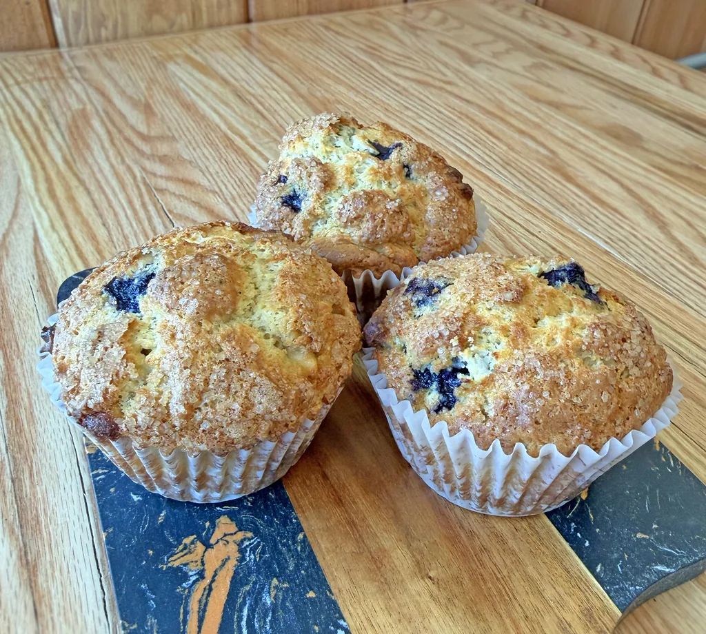 A berry and white chocolate muffin