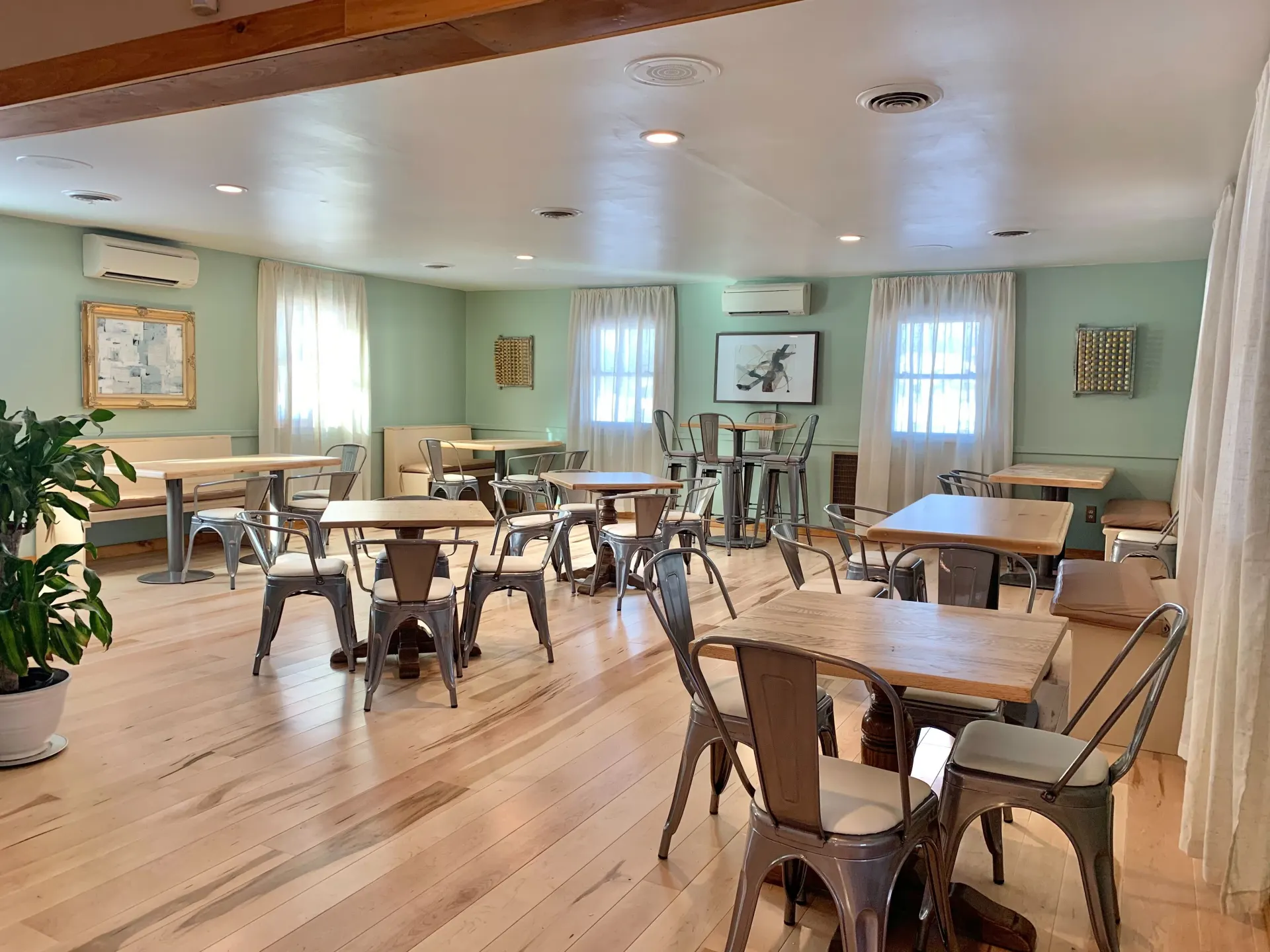 The dining room at Alder, set with tables for groups
