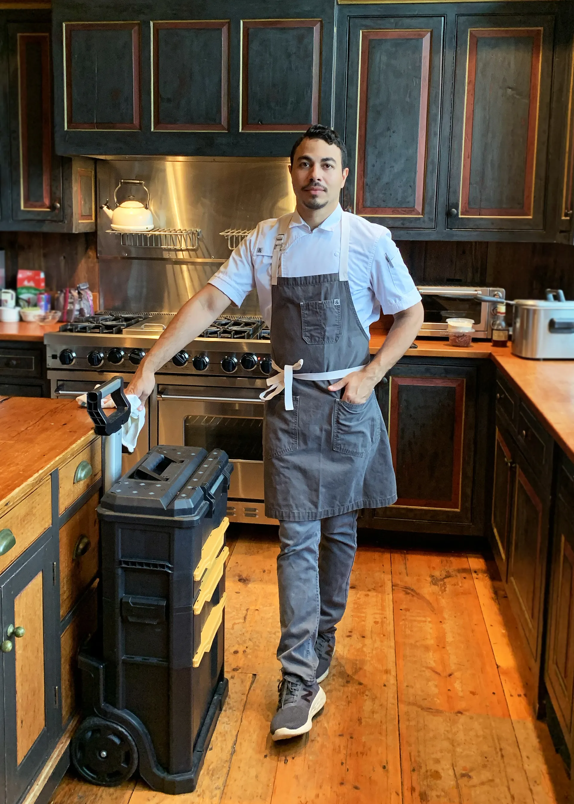 Chef Miguel Calderon in the kitchen before a private dinner