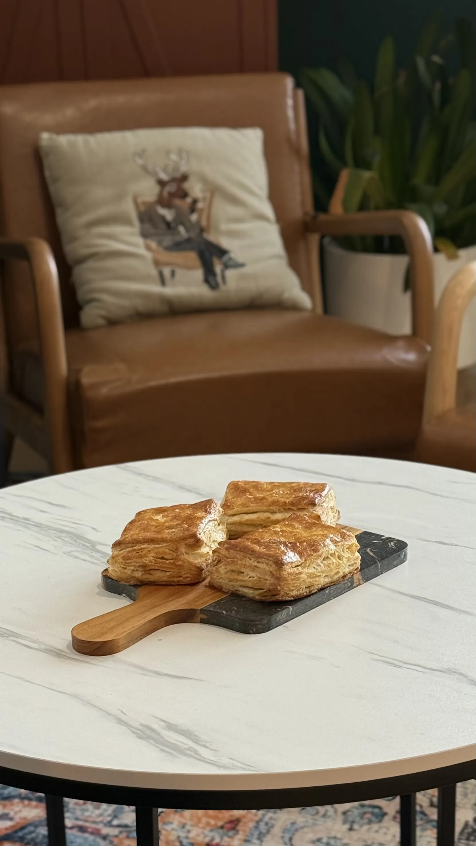 Flaky pastries on a table at Alder